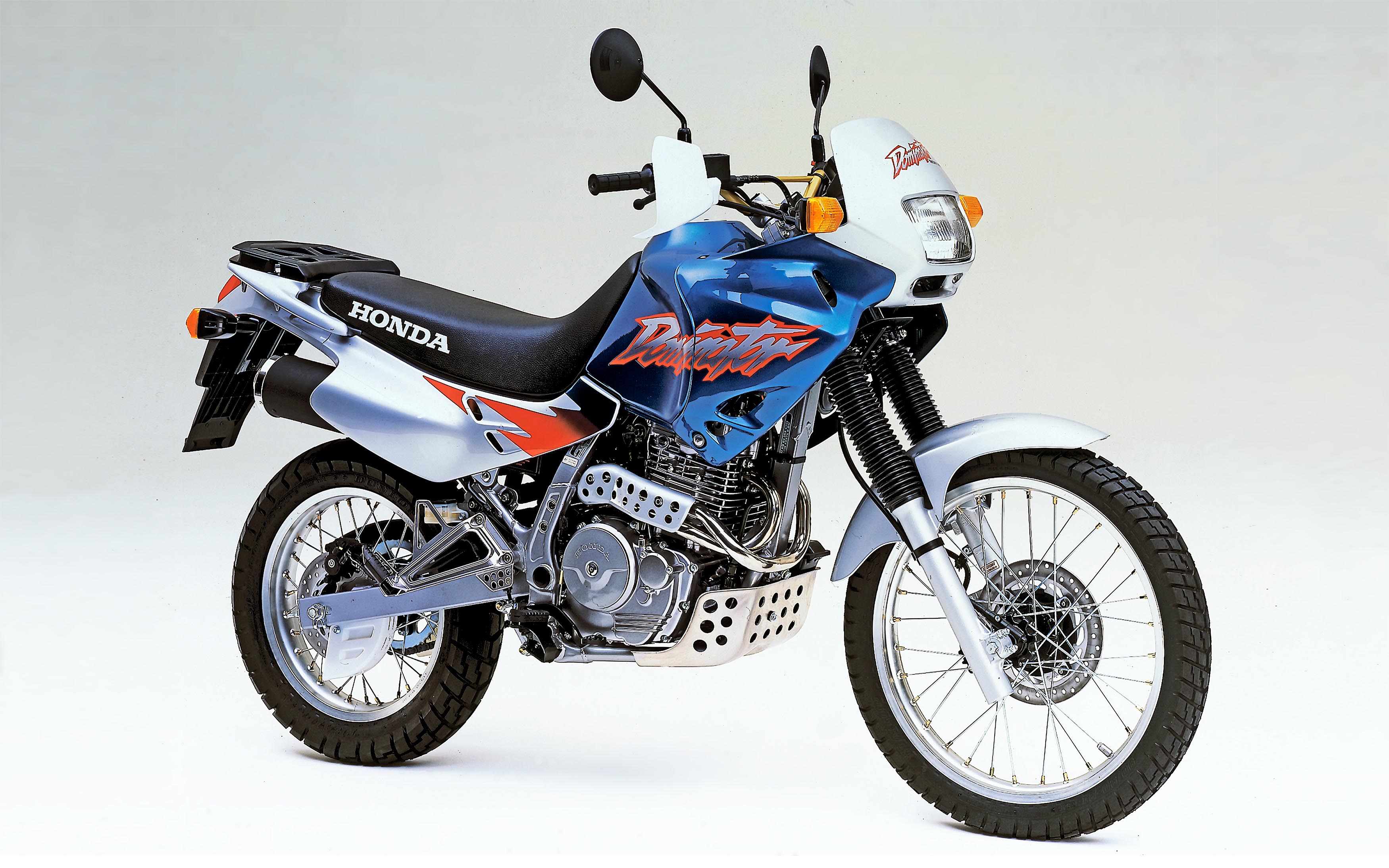 Мотоцикл Honda NX 650 Dominator 1999 Цена, Фото, Характеристики, Обзор,  Сравнение на БАЗАМОТО